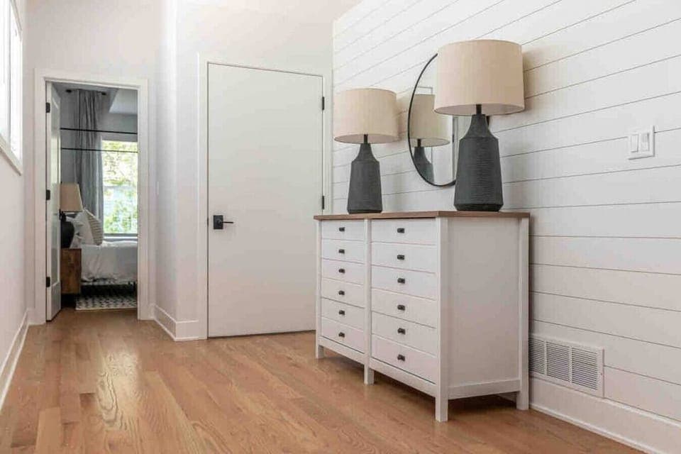 Second floor hallway leads 3 bedroom and to the third floor