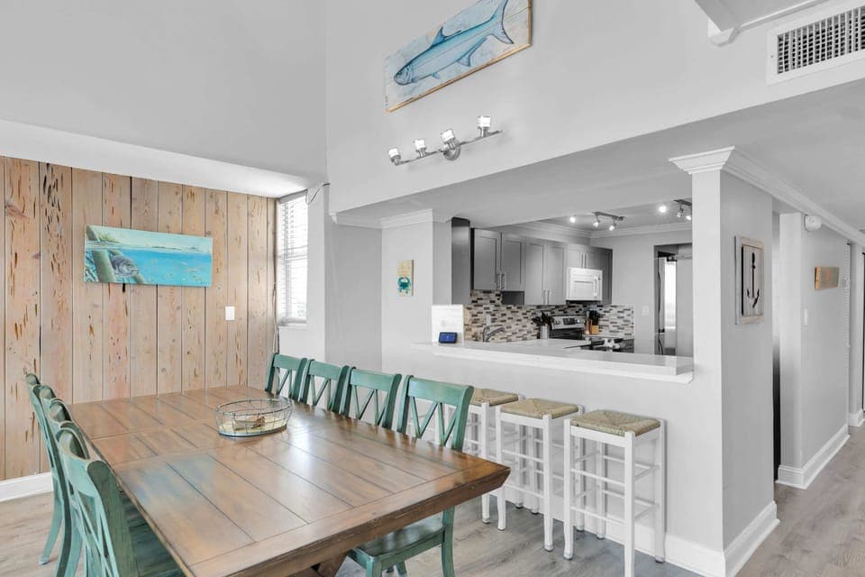 Eating area & Kitchen. Entryway seen to the far right of picture