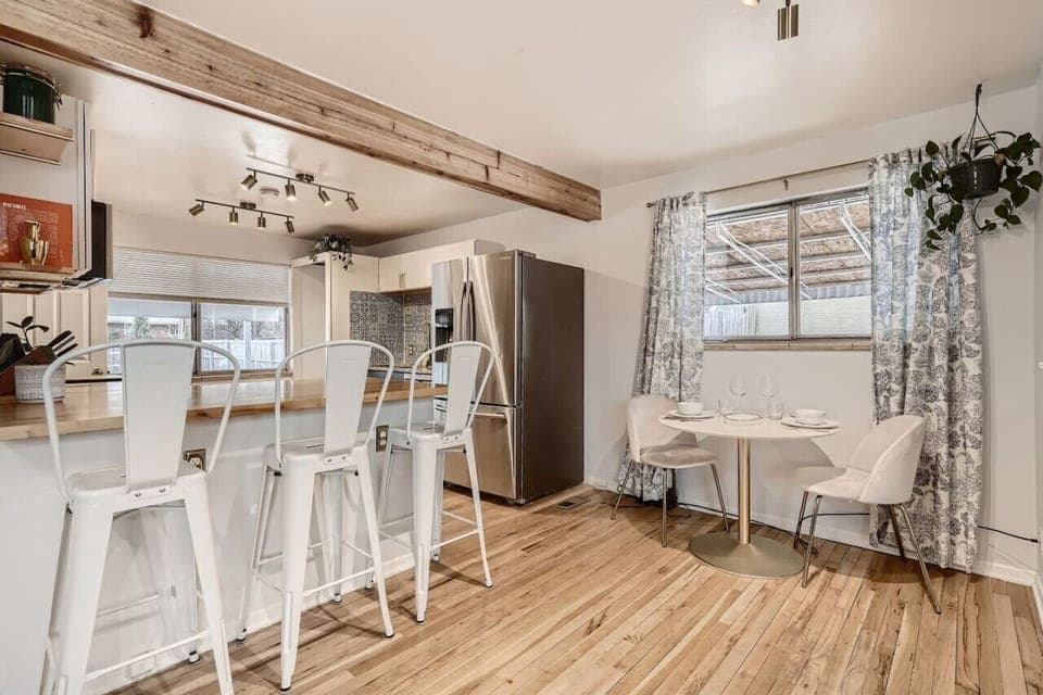 Prepare your favorite meals in the spacious, fully equipped kitchen and serve them on the nearby dining table.