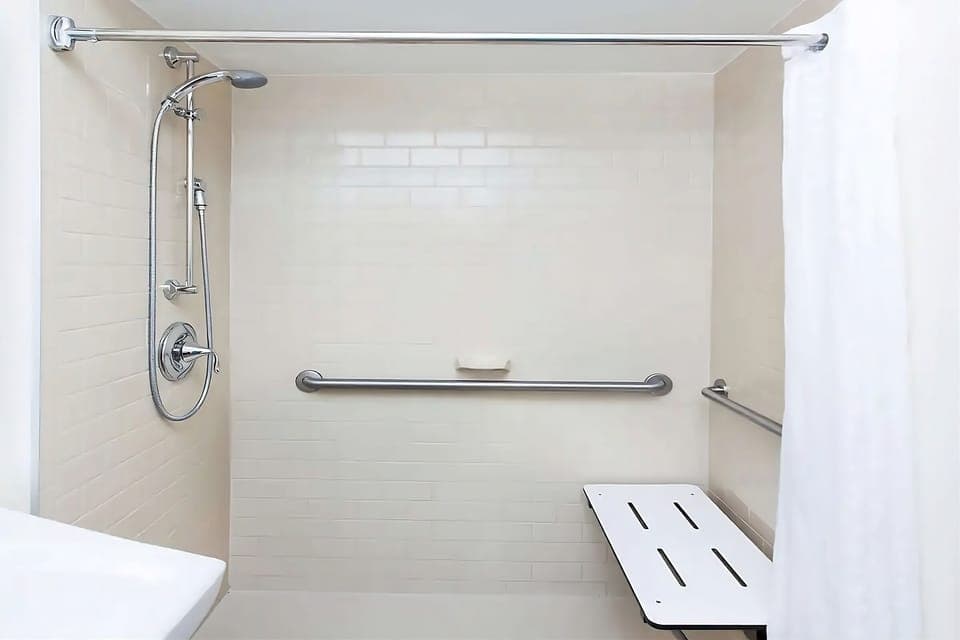 Rinse off easily in a clean, accessible walk-in shower.