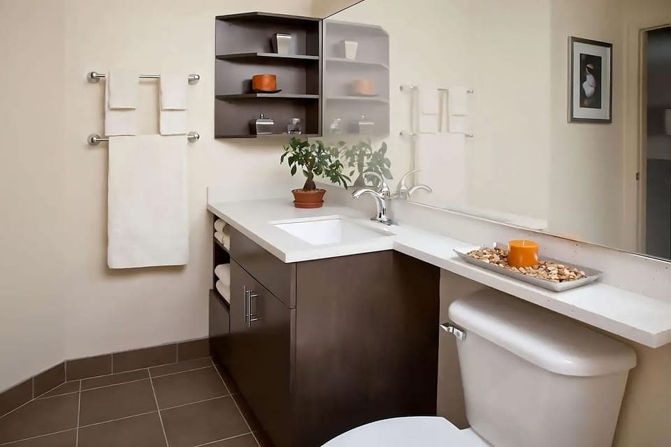 Refresh at a spacious vanity with bright, spa-like lighting.