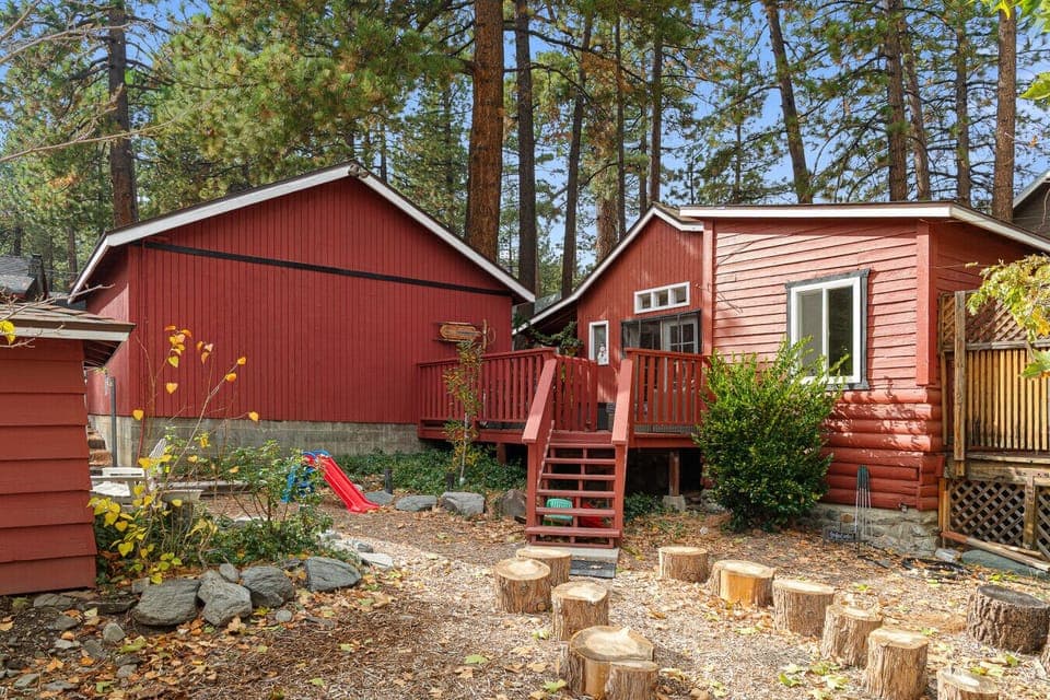 Nestled in the pines, Cozy Cottage offers two decks and a fully fenced-in yard.