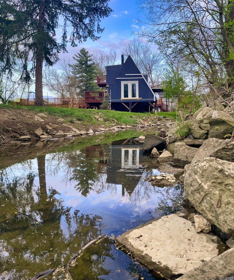 View from College Street bridge of A-frame duplex at 517-519 College Street