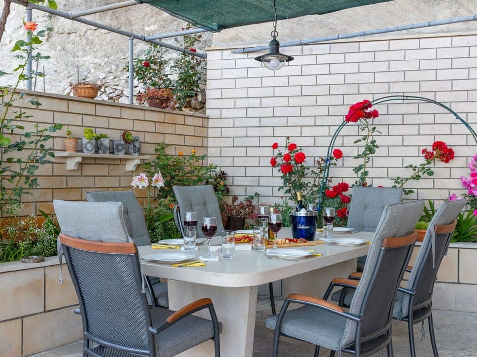 Plant, Table, Flower, Property, Furniture, Flowerpot, Chair, Outdoor Table, Outdoor Furniture, Interior Design