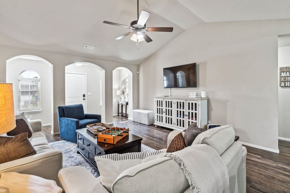 Spacious & comfortable family room with games & 55-inch smart tv.