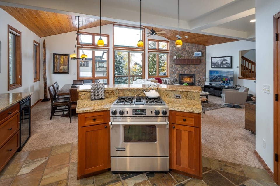 You'll love the open floor plan from the kitchen to dining area to living room and then out to the deck