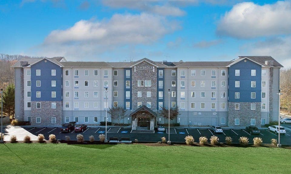 Exterior view of the property under a clear blue sky.