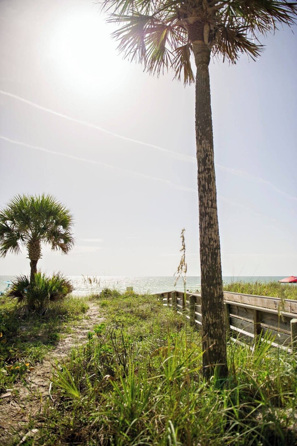 The beach is a short 2-3 minute walk; we provide beach wagons, beach umbrellas, beach towels, and beach umbrellas.