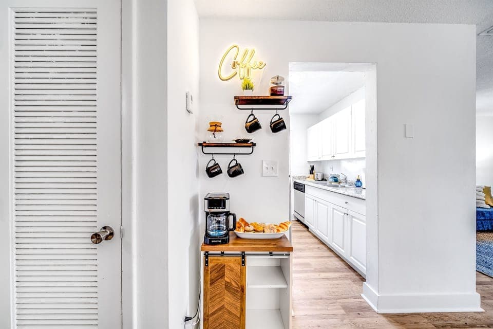 Nothing's cozier than a hot cup of coffee, right? At Palm Wave Stays, every unit comes with a coffee station for ultimate relaxation. Curl up with a book or your fave series & let your caffeine kick in. Book now! www.palmwavestays.com