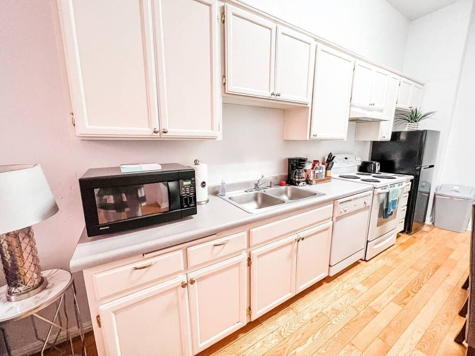 Full Kitchen includes all pots, pans, silverware, coffee maker, coffee, sugar, creamer, tea, blender, toaster, refrigerator, microwave, glasses, wine glasses and cooking/eating utensils