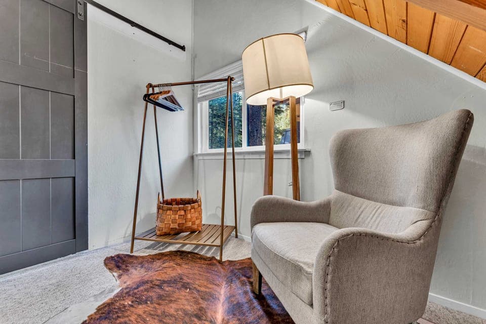 Bedroom 3: Queen bed, upper level, clothes rack