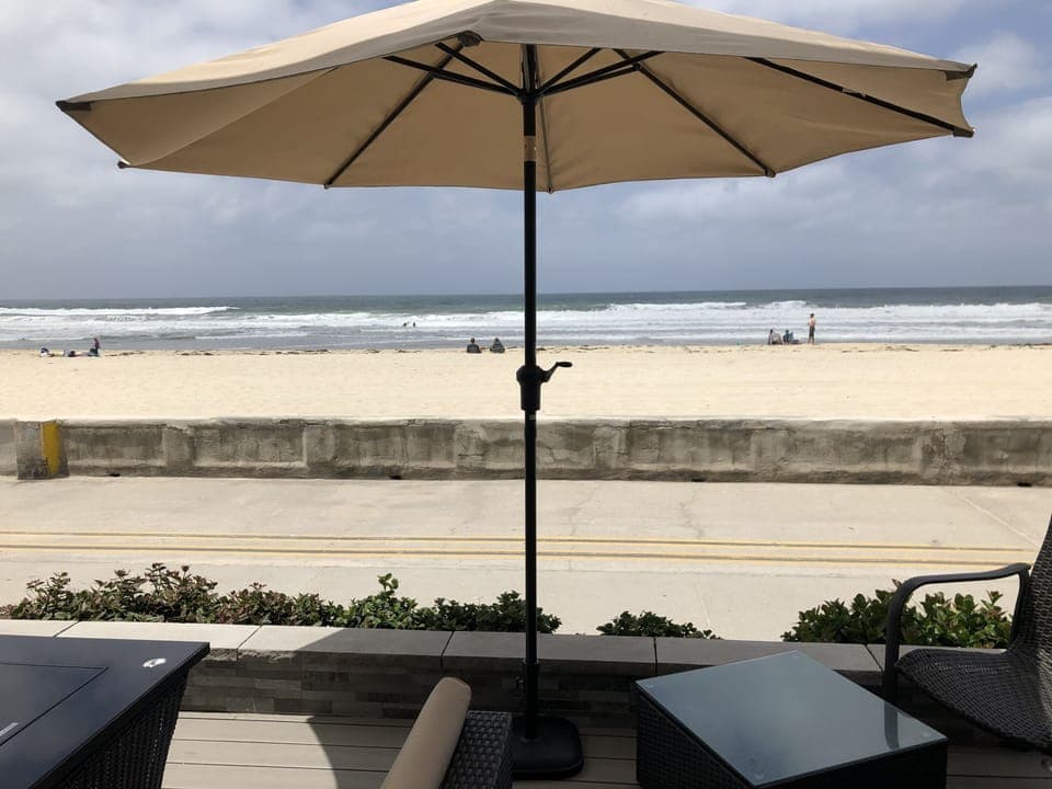 Ocean Front Condo. Walk right on to the beach or watch everything from the patio