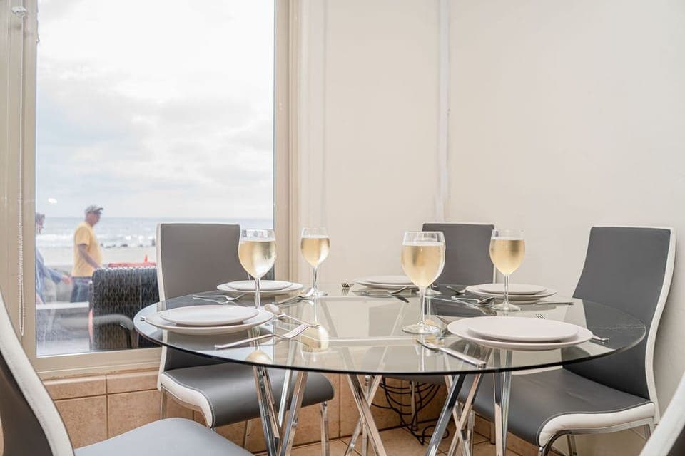 Dine next to the ocean, beach and boardwalk with sit down views & great ambience