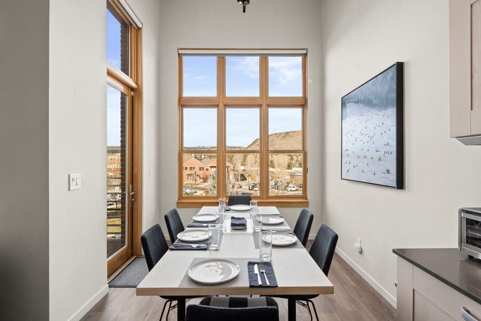 Dining area - six comfortably.  The door on left goes out to the patio.