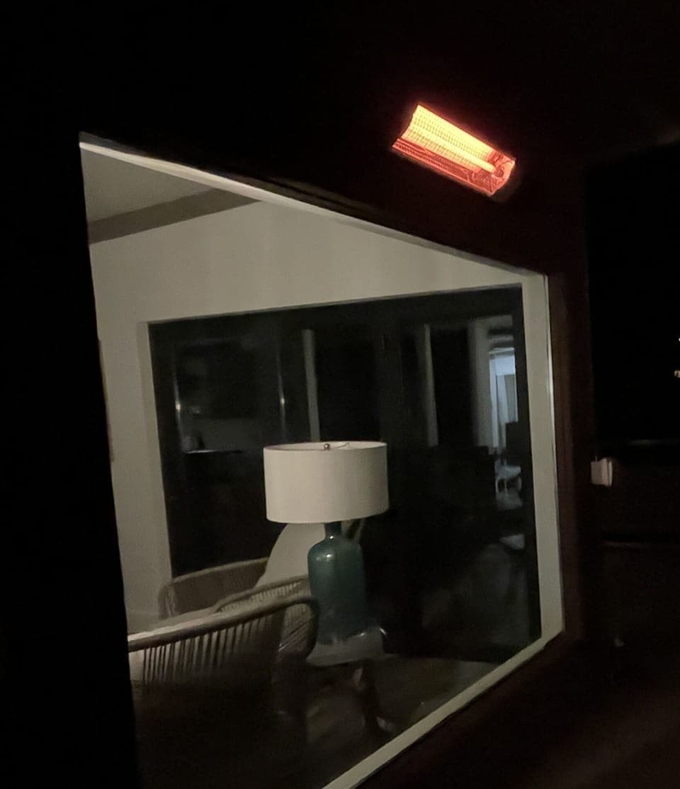 Enjoy theviews under the heat lamp