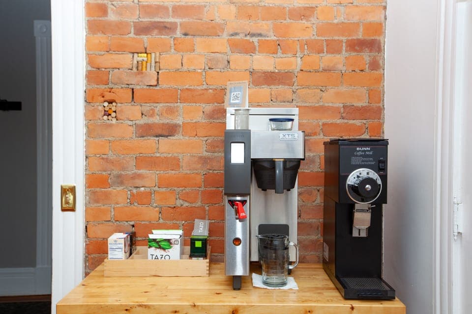 Coffee maker in first dining room