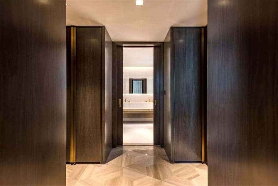 Master bedroom walk through closet