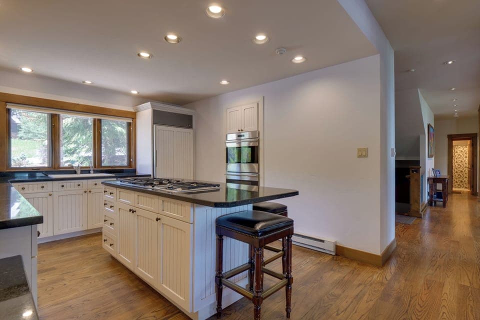 A large island with seating, perfect for chatting while cooking.