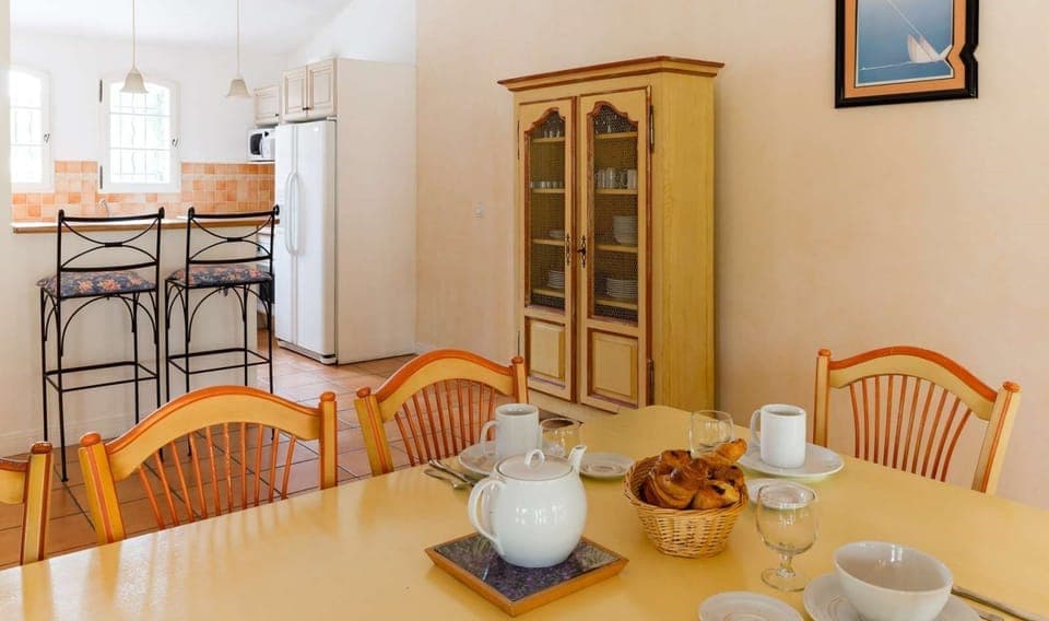 Entertain and enjoy meals together at the dining room table.