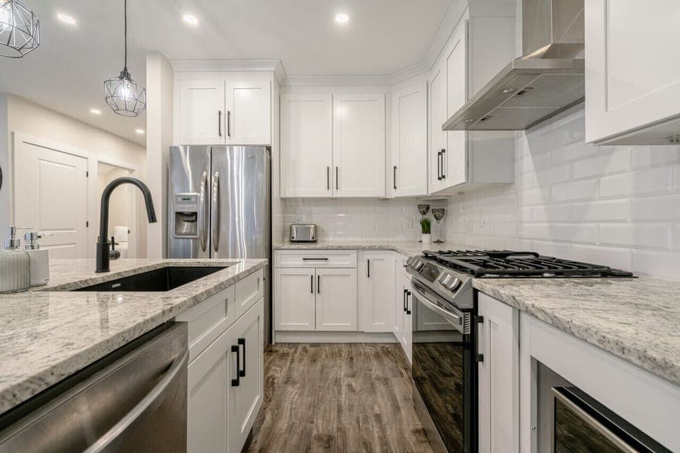 Modern Open Kitchen with high-end appliances and large island perfect for entertaining