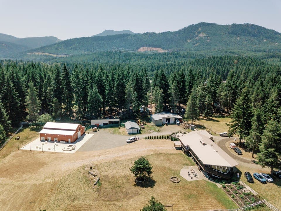 Aerial view of your private mountain escape — 50 acres all to yourself.