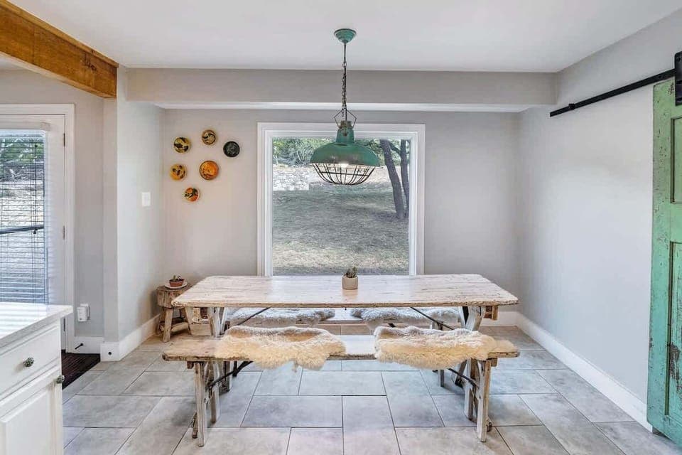 La Casa has a dining table + 3 seats at the kitchen counter for dining.