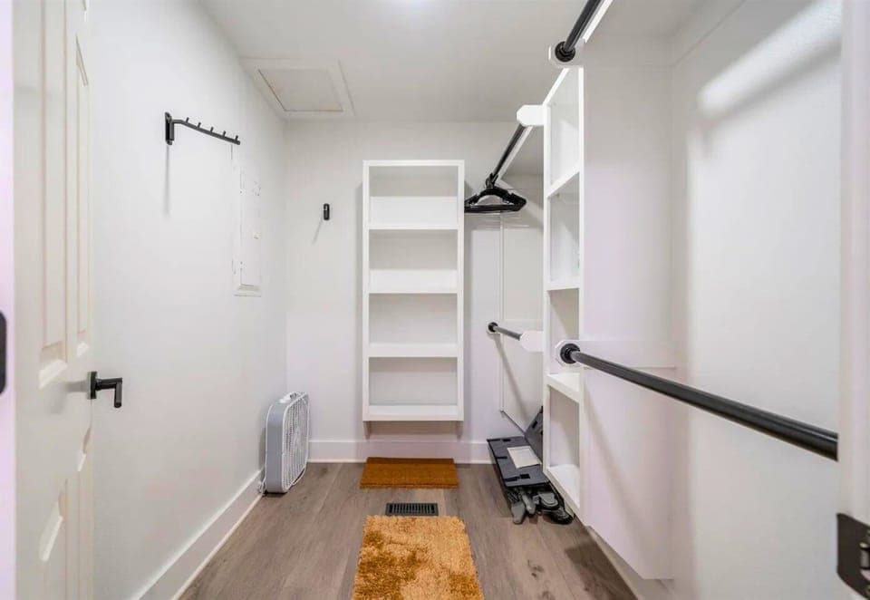 [Primary Closet] The Primary Bedroom Also has a Large Closet, Perfect for Suitcase Storage!