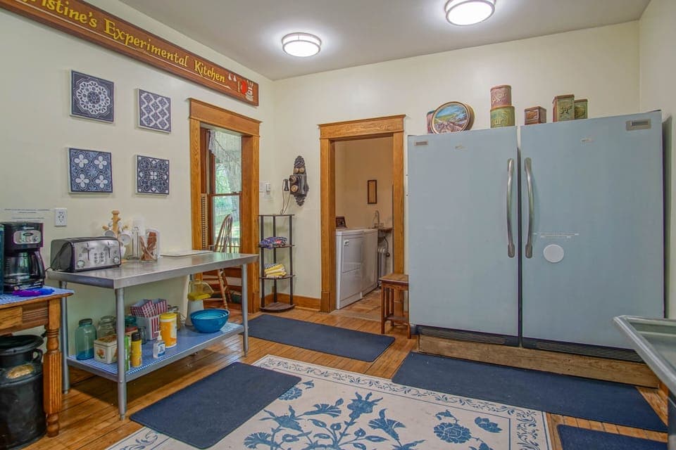 The oversized refrigerator in the kitchen.