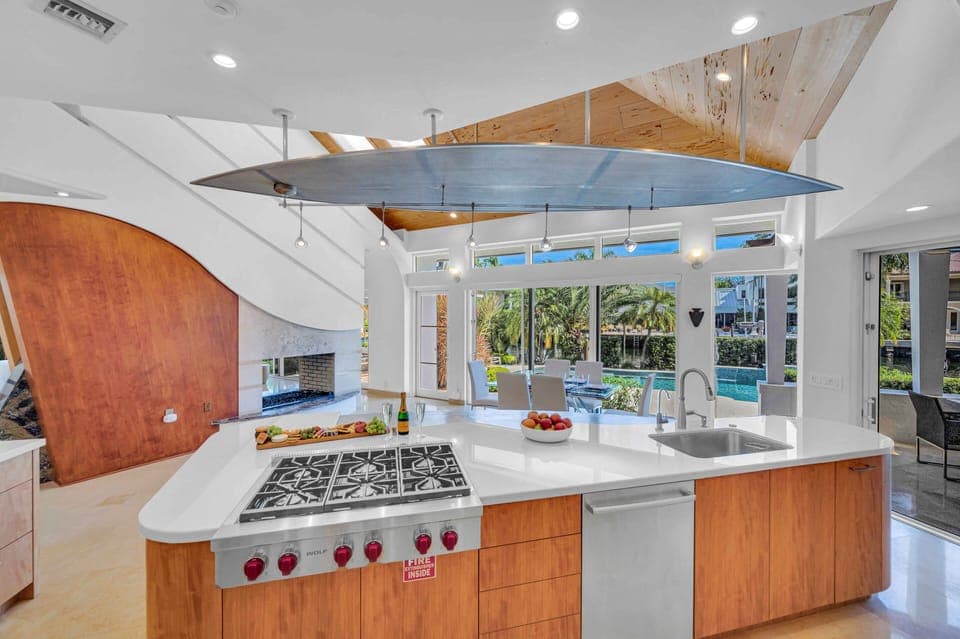 The kitchen has state of the art appliances, plenty of storage space, and excellent views of the pool and the waterway.