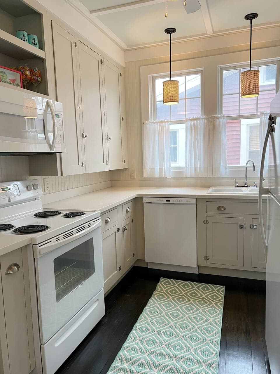 Kitchen comes equipped with microwave, coffee maker, toaster and dishwasher.