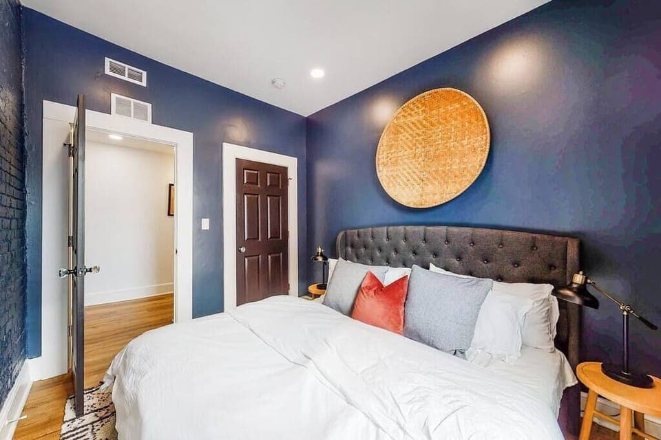 Bedroom 3: There are also two round side tables in each corner, offering a handy spot for your phone, making sure it's easily accessible.