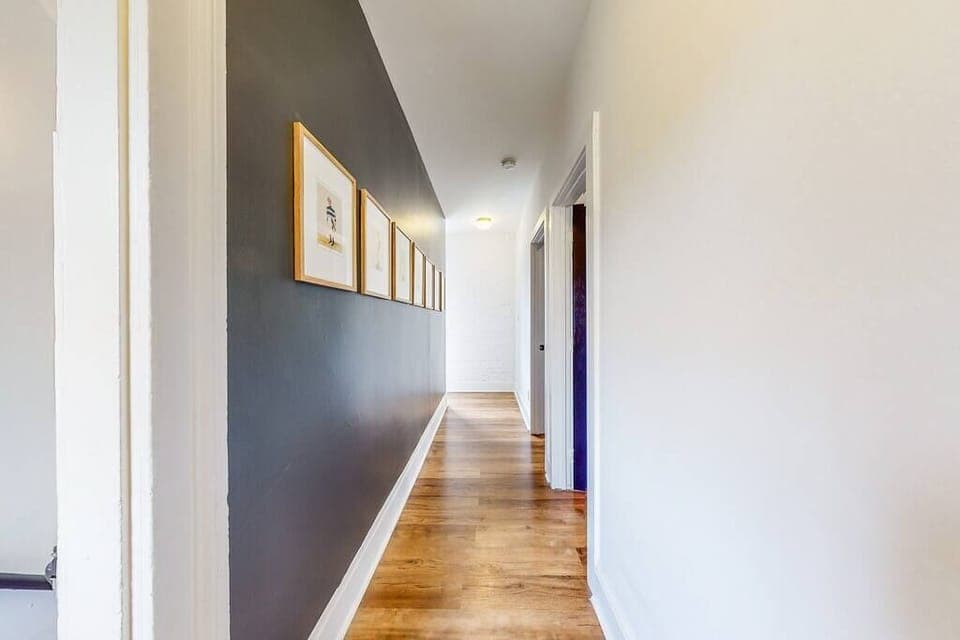 This hallway on the second floor leads to each of the bedrooms.
