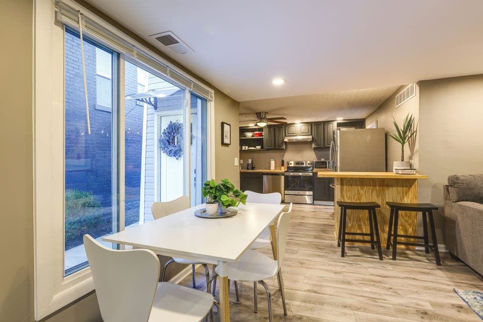 Dining Area | Dishware & Flatware Provided | Breakfast Bar w/ Additional Seating