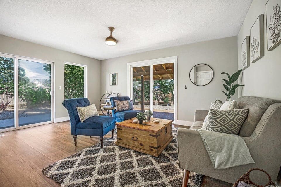 Sitting area right off the kitchen with access to yard and covered patio