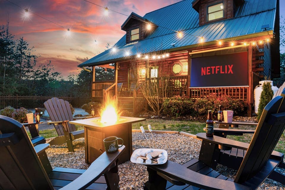 Enjoy some fun movie nights with your private outdoor cinema and fire pit area!