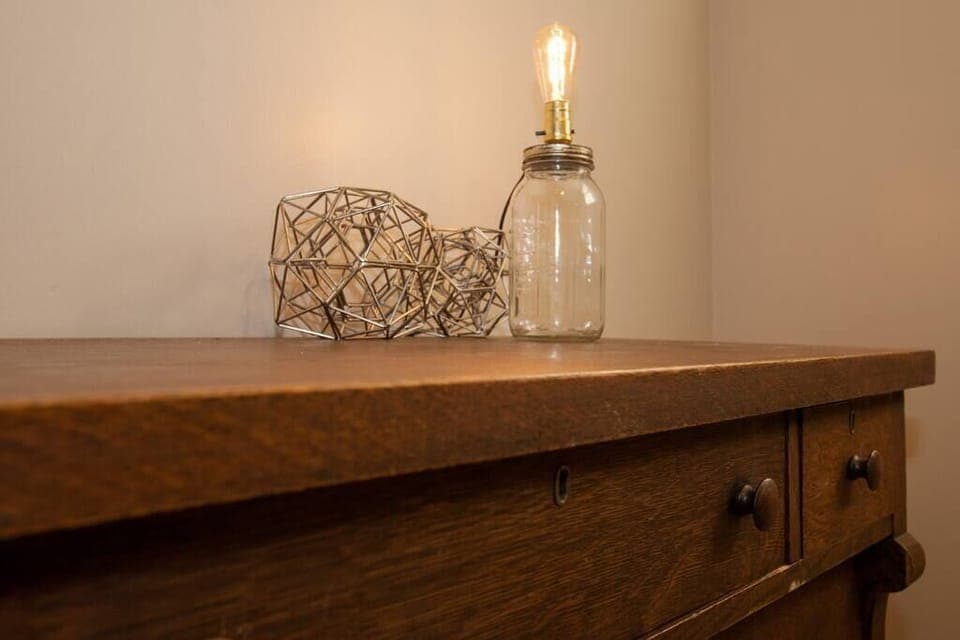 Cool ambience and an antique dresser make this place feel at home