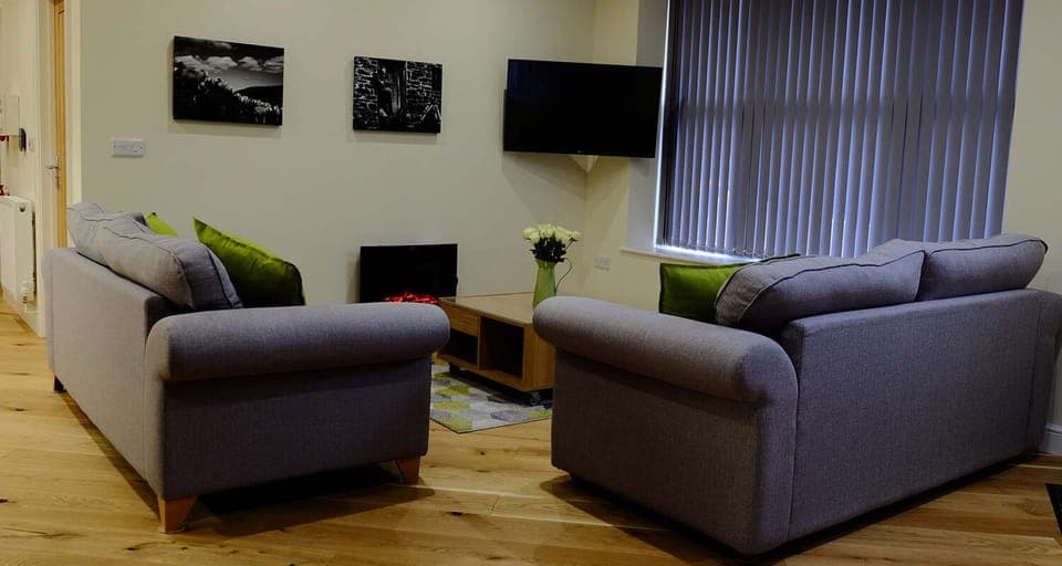 Living room at Mid Wales Holiday Lets Old Drapers Apartment