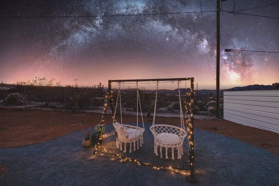 Swing into relaxation in our beautiful desert backyard, catching the sunset.