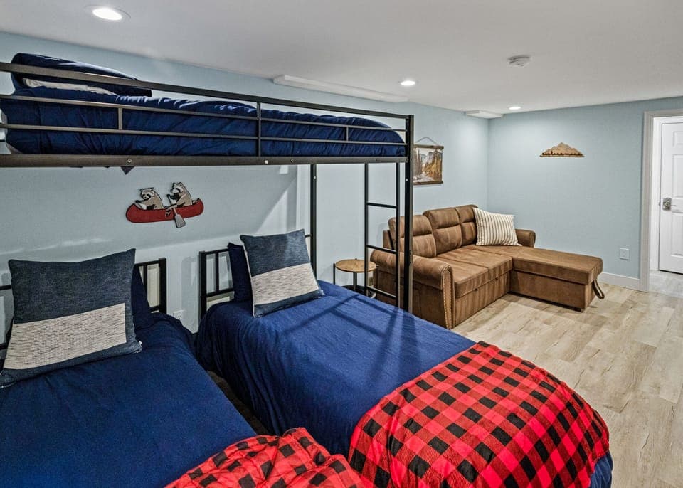 3 Twin beds/ Pull out sofa (basement)