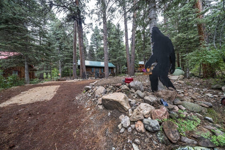 Big Foot waiting to welcome you at the front of the cabin 