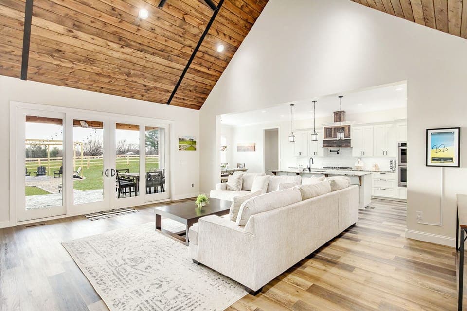 Cozy up on the couch after a day on the Bourbon Trail, with stunning views of the fire pit and countryside through the expansive sliding doors.