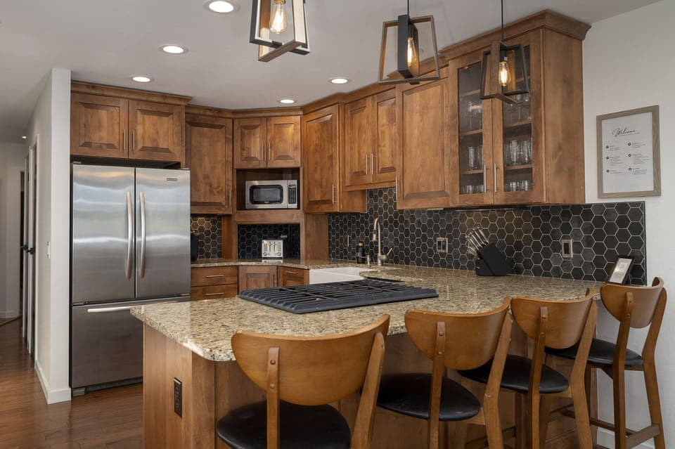 Fully stocked kitchen with high end cookware & dishes & wide array of spices