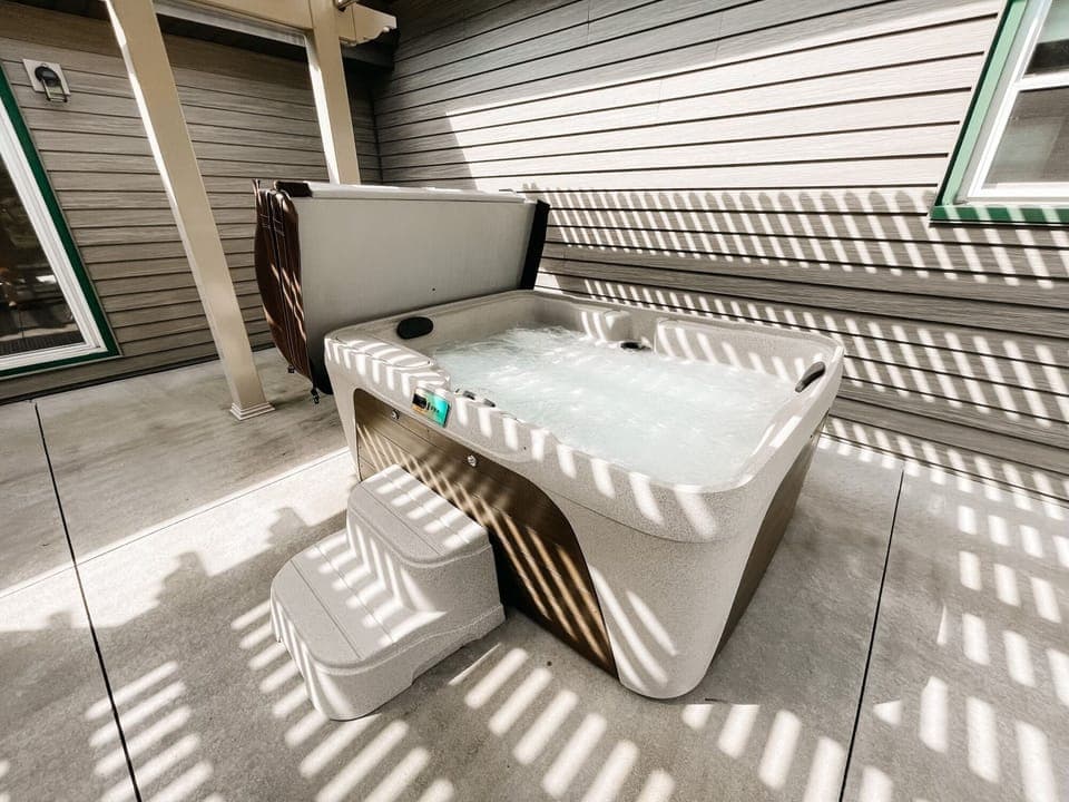 Four person hot tub.