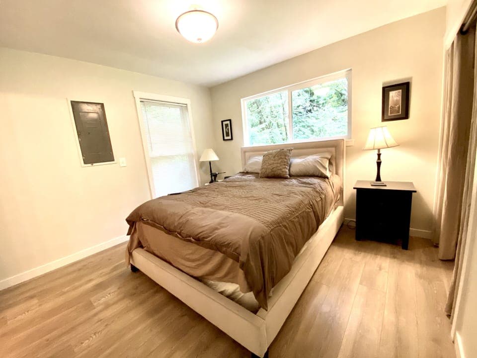 Nice master bedroom with wonderful light and forest views
