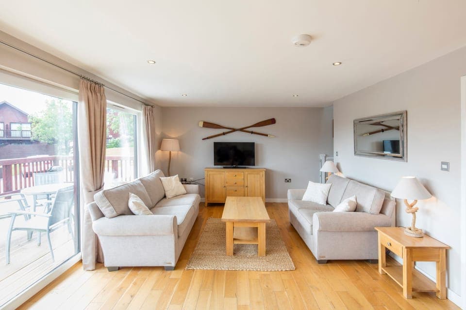 The ground floor sitting room with view to the terrace