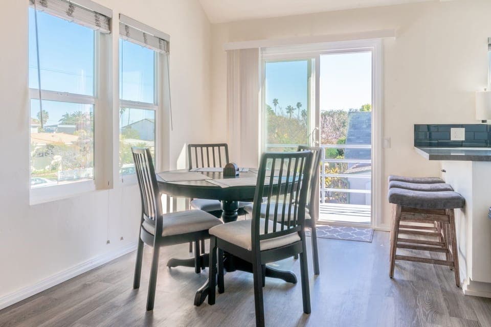 Expandable dining table with pop up expansion leaf.  