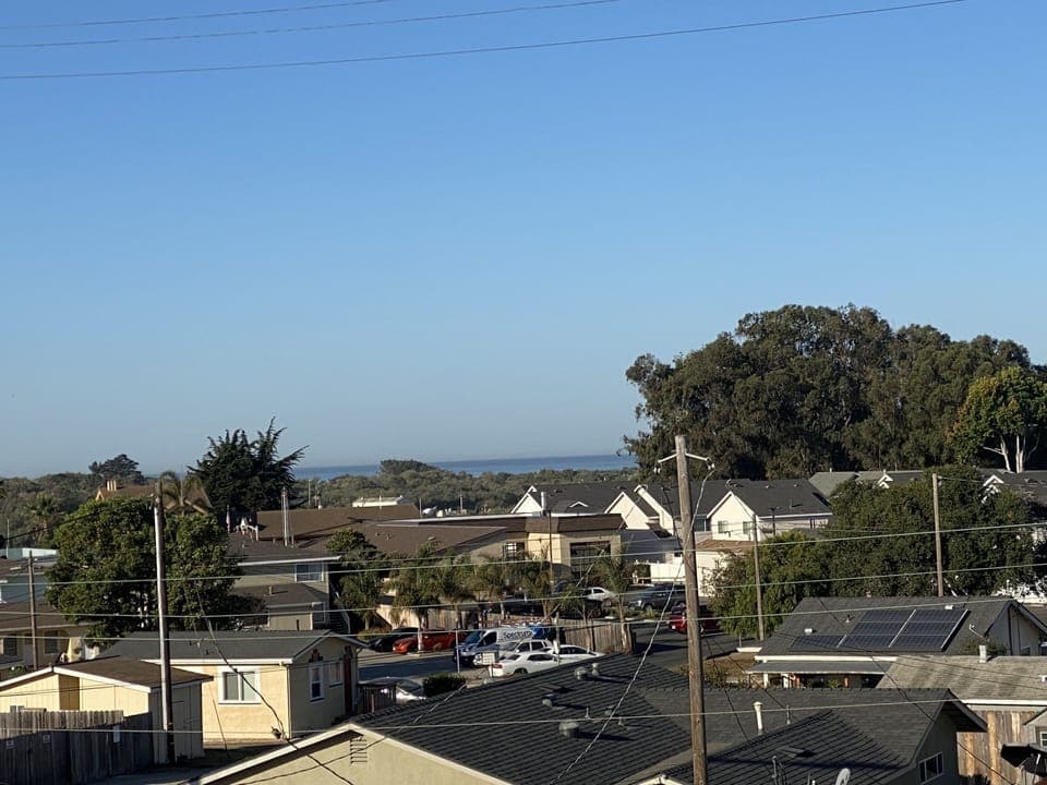 Peek-a-boo ocean view mid-day from 3rd story Viewing deck