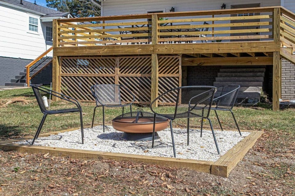 Outdoor Fire Pit Area: Gather around the modern fire pit for unforgettable evenings under the stars!