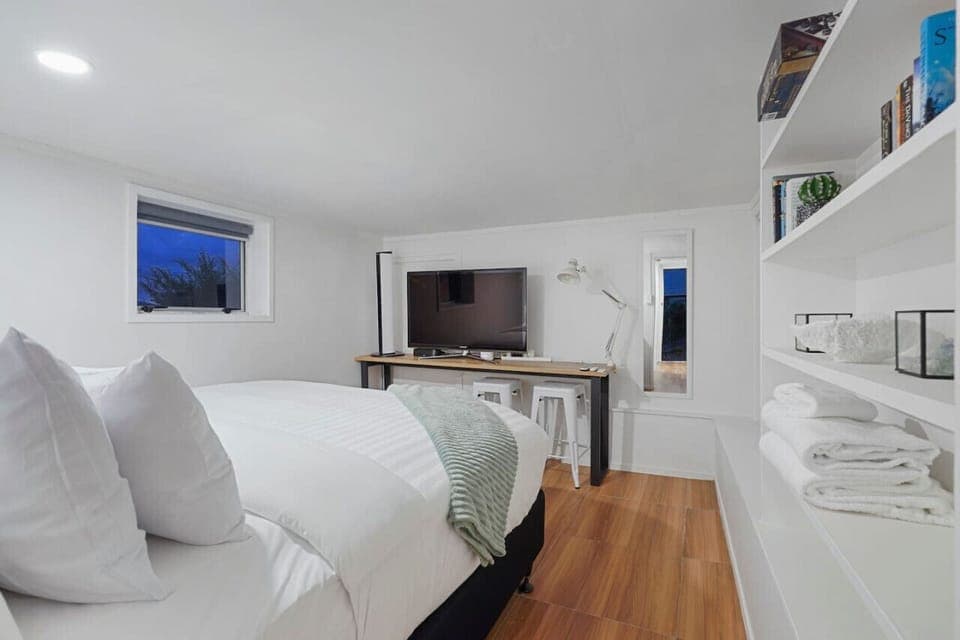 There is seating at the table with room for your laptop.