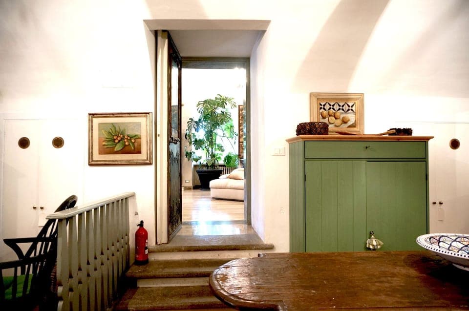 Door from large downstairs kitchen to the sitting room